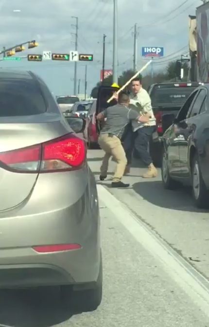 Image: Two Men Have Epic Bat-Stick Fight At Intersection